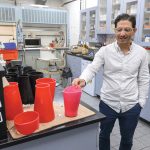 Meet the Makers: Moment of ingenuity helped Mearthane to continue rolling TRIAL AND ERROR: Alejandro Martinez, Mearthane Products Corp.’s marketing director, shows some experimental moldings in the company’s development lab inside its Cranston headquarters.
PBN PHOTO/MICHAEL SALERNO