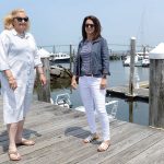 SAILING SUCCESSION: Sanderson “Sandy” Carney, left, founder of yacht brokerage Sanderson Yachting in Newport, recently brought in Erin Pavane as a business partner to help her grow and run the business while Carney considers stepping down from full-time work. PBN PHOTO/ELIZABETH GRAHAM
