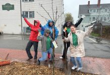 A ‘Neighborhood’ that is welcoming TREE’S COMPANY: Neighborhood Health Plan of Rhode Island employees plant a tree during a community initiative at Elmwood Nursing & Rehabilitation Center in Providence.
COURTESY NEIGHBORHOOD
HEALTH PLAN OF RHODE ISLAND