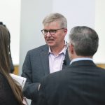 Five Questions With: Patrick Gilligan HUDDLING UP: Point32Health Co. CEO and President Patrick Gilligan, center, speaks with company colleagues.
COURTESY POINT32HEALTH CO.