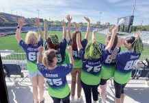 Centreville Bank puts a high value on well-being TEAM SPIRIT: Centreville Bank employees gather during the company’s employee block party event at Centreville Bank Stadium in Pawtucket.
COURTESY CENTREVILLE BANK