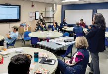 CLASS IN SESSION: Groov-Pin Corp. employees attend a financial lunch-and-learn session at the Smithfield-based company’s manufacturing plant. COURTESY GROOV-PIN CORP.