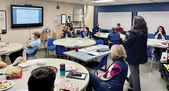 CLASS IN SESSION: Groov-Pin Corp. employees attend a financial lunch-and-learn session at the Smithfield-based company’s manufacturing plant.
COURTESY GROOV-PIN CORP. CLASS IN SESSION: Groov-Pin Corp. employees attend a financial lunch-and-learn session at the Smithfield-based company’s manufacturing plant.
COURTESY GROOV-PIN CORP.