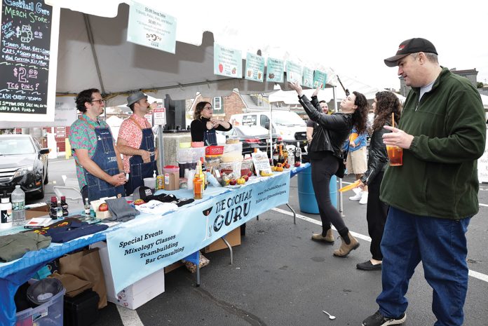 FLAVORFUL FESTIVAL: One SouthCoast Chamber of Commerce will present the 20th annual Blount Fine Foods Corp. New Bedford Seaport Chowderfest on Oct. 11 at City Pier in New Bedford. Pictured are attendees at a previous edition of the festival.  COURTESY ONE SOUTHCOAST CHAMBER OF COMMERCE