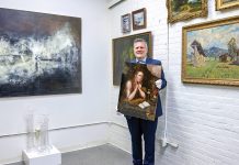 Dym finds value in working with art OPEN FOR BIDS: Vallots Auctioneers founder Michael Dym with some of the art to be auctioned at his auction house in Providence. Dym started the business in New York City in 2003 but moved it to Providence in 2021.
PBN PHOTO/MICHAEL SALERNO