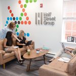 Half Street Group building a brand for themselves, and others STRATEGIC PLANNING: From left, Half Street Group team members Nadia Engenheiro, digital and social media strategist; Account Director Hillary Lima; senior account executive Chelsea DeCesare; and account executive Kerri Tallman discuss a marketing plan at the public relations firm’s Providence office.
PBN PHOTO/TRACY JENKINS