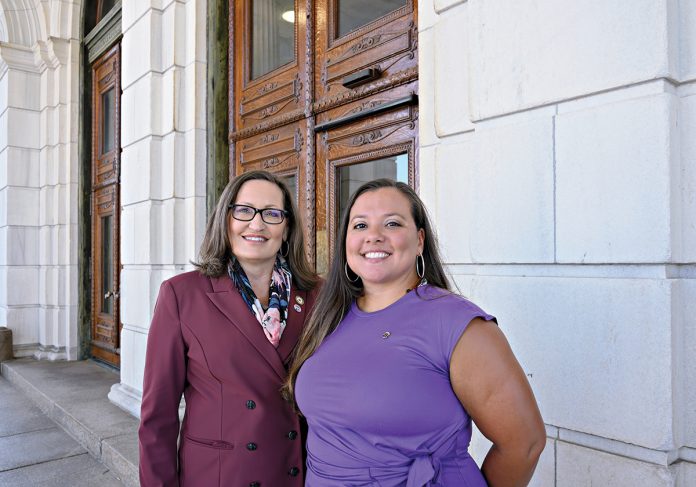 FEELING PROTECTIVE: Sen. Lori Urso, left, and Rep. Karen Alzate, both Democrat lawmakers from Pawtucket, led the effort to amend Rhode Island’s Fair Employment Practice law to include menopause-related health issues to the list of medical conditions that employers have to accommodate.  PBN PHOTO/MICHAEL SALERNO  