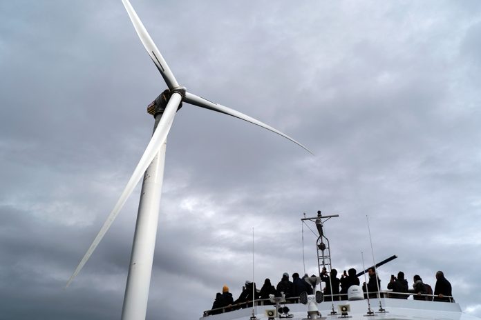 INDUSTRY HEADWINDS: Guests tour one of the turbines of America’s first offshore wind farm, off the coast of Block Island, during a wind power conference in 2022.
ASSOCIATED PRESS FILE PHOTO/DAVID GOLDMAN INDUSTRY HEADWINDS: Guests tour one of the turbines of America’s first offshore wind farm, off the coast of Block Island, during a wind power conference in 2022.
ASSOCIATED PRESS FILE PHOTO/DAVID GOLDMAN