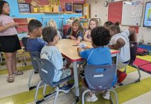 As funding shrinks, can Learn365RI still get results? MORE THAN A GAME: Janice Mascarelli, center, a teacher at the Newport Family Child Opportunity Zone Summer Learning Academy at Pell Elementary School in Newport, plays Alphabet Zoop card games with Pell students to build letter and sound recognition skills as they prepare to enter first grade.
COURTESY NEWPORT FAMILY CHILD OPPORTUNITY ZONE SUMMER LEARNING ACADEMY