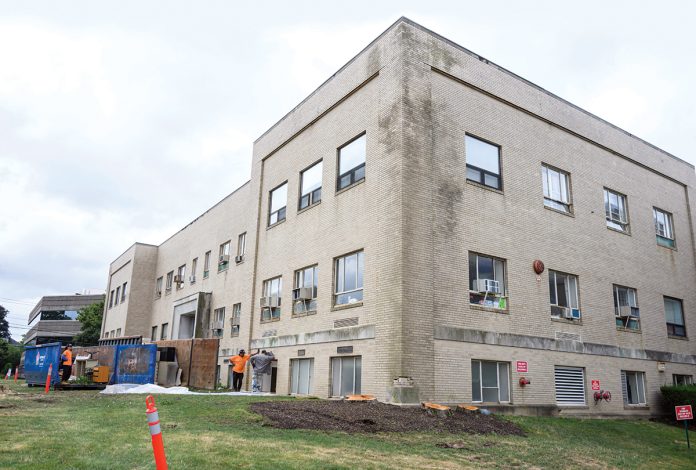 ALL IN: The administrative wing at The Miriam Hospital in Providence will be demolished to make way for a new emergency department and other facilities.  PBN FILE PHOTO/­MICHAEL SALERNO