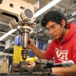 DRILLING DOWN: Mazinho Palencia, a Community College of Rhode Island graduate, works on a drill press in the school’s ­Advanced Manufacturing Lab in 2024. COURTESY COMMUNITY COLLEGE OF RHODE ISLAND