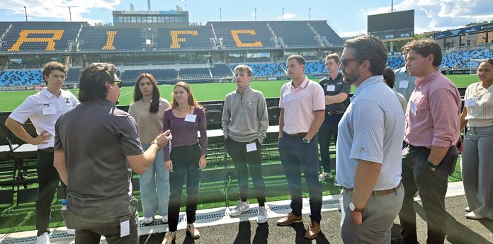 OUTDOOR CLASSROOM: Providence College has launched a Master of Science in Sports Administration program this fall in partnership with the minor league soccer team Rhode Island FC. Students in the inaugural class get a behind-the-scenes tour of Centreville Bank Stadium in Pawtucket, home to RIFC. COURTESY PROVIDENCE COLLEGE