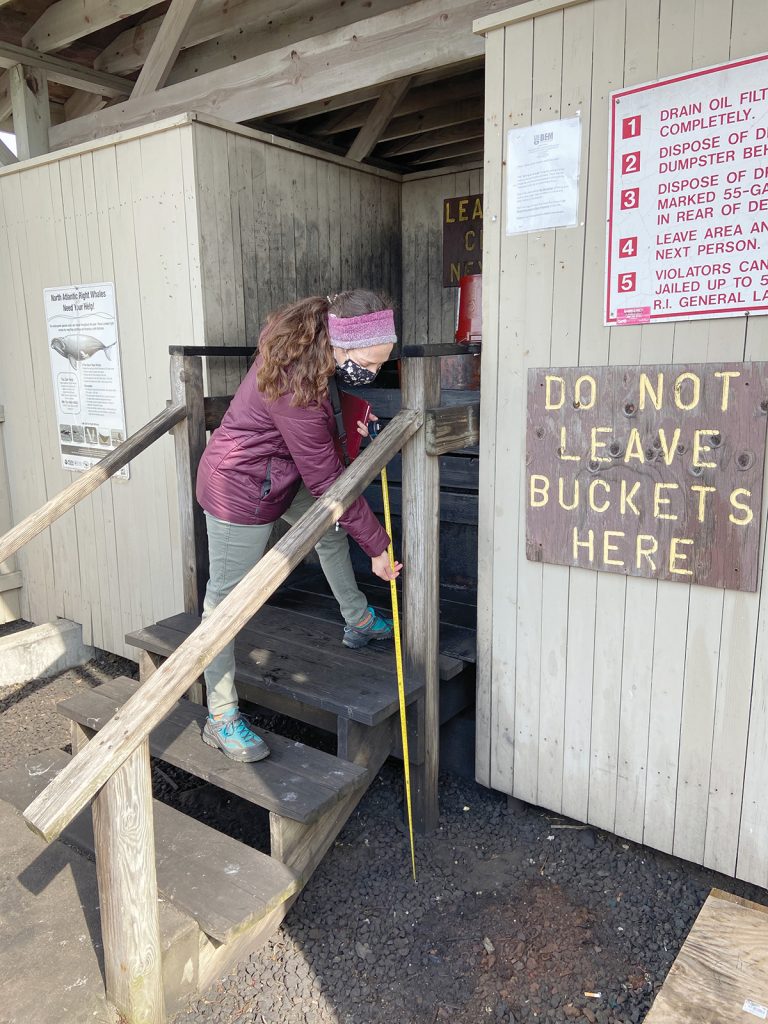 DATA COLLECTION: Kyle McElroy, a research assistant with professor Austin Becker, chair of the Department of Marine Affairs at the University of Rhode Island, collects data for the Rhode Island Coastal Hazards, Analysis, Modeling Prediction tool. COURTESY AUSTIN BECKER 