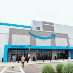 THE ‘AMAZON EFFECT’: Warehouse looms over Johnston, but will it fulfill economic promise? THE
NEW
HUB:
The entrance of the Amazon.com Inc. fulfillment center in Johnston. The 3.8 million-square-foot building has left its mark on the town.
COURTESY
AMAZON.COM INC.