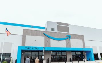 THE  NEW  HUB:  The entrance of the Amazon.com Inc. fulfillment center in Johnston. The 3.8 million-square-foot building has left its mark on the town.  COURTESY  AMAZON.COM INC.