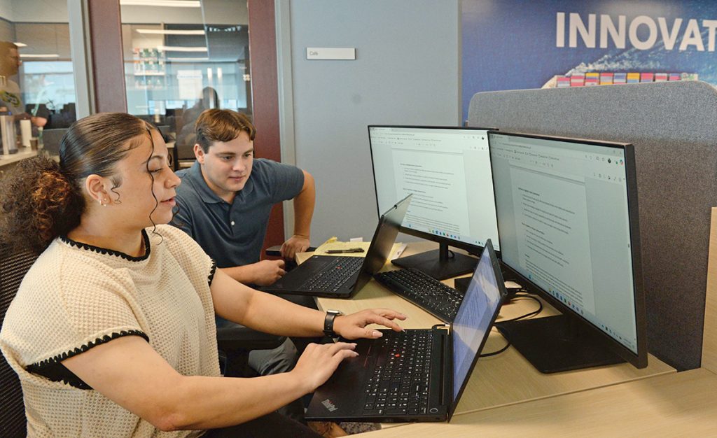 FRESH TALENT: Alyssa Dansby, left, and Ryan Finzio are interns at Falvey Insurance Group in North Kingstown.
PBN PHOTO/ELIZABETH GRAHAM