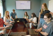 YOUTH MOVEMENT: A group of interns works together during a meeting at Falvey Insurance Group in North Kingstown. In addition to internships, the agency has launched an underwriter training program and is looking to start apprenticeships. PBN PHOTO/ELIZABETH GRAHAM