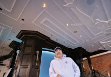 New federal tax rules on tips spark confusion READY FOR CHANGES: John Elkhay, co-owner of Chow Fun Inc., stands in the dining room of Ten Prime Seafood, a restaurant the company is preparing to open on Empire Street in Providence. Elkhay says he’s trying to provide clarity to his employees on new federal rules about tax on tips.
PBN PHOTO/MICHAEL SALERNO