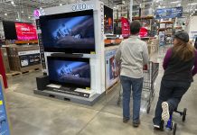 Consumer sentiment tumbles close to record lows in latest U Michigan survey