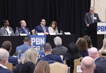 PBN Health Summit panel: Could R.I. fix doctor shortage by looking to other states? HEALTHY TALK: Dr. Edward McGookin, third from the left, speaks during a panel discussion at Providence Business News’ Fall Health Care Summit: Shaping the Future of Care on Oct. 30. McGookin is chief of primary care at Brown Health Medical Group Primary Care. With him during the first of two panel discussions are, from left, Victoria Williams, assistant professor of health care administration at Rhode Island College; Dr. Roger Mitty, president and chief operating officer of Care New England Medical Group; and Sen. Pamela Lauria, a nurse practitioner. Moderating is PBN Editor Michael Mello, standing.
PBN PHOTO/MIKE SKORSKI