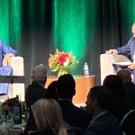CITIZENS FINANCIAL Group Inc. Chairman and CEO Bruce Van Saun, left, speaks with Providence Chamber of Commerce Chairman Rick Metters during a "fireside chat" on Tuesday night at the R.I. Convention Center. / PBN PHOTO/MATTHEW MCNULTY