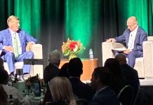 CITIZENS FINANCIAL Group Inc. Chairman and CEO Bruce Van Saun, left, speaks with Providence Chamber of Commerce Chairman Rick Metters during a "fireside chat" on Tuesday night at the R.I. Convention Center. / PBN PHOTO/MATTHEW MCNULTY