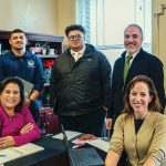 SHINING A LIGHT: The Pawtucket Commerce Department’s “52 in 52” marketing campaign, in which it used social media to highlight a small business each week for a year, brought awareness to many businesses that had little to no social media presence. Department members pictured, standing from left, are interns Isiah Gois and Justin DeCosta, along with Commerce Director Jason Pezzullo; and, sitting from left, are Deputy Director of Commerce Sandra Mazo and Cultural Affairs Coordinator Jennifer Kilsey. COURTESY CITY OF PAWTUCKET