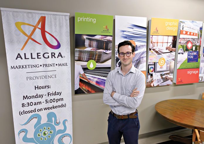FRESH BLOOD: Entrepreneur Cristian Molina Cornejo says he’s excited to take the reins of Allegra Marketing Print Mail in Providence as the new owner and president of the business and continue building the legacy that previous owners Bud and Karen McCann developed.
PBN PHOTO/MICHAEL SALERNO FRESH BLOOD: Entrepreneur Cristian Molina Cornejo says he’s excited to take the reins of Allegra Marketing Print Mail in Providence as the new owner and president of the business and continue building the legacy that previous owners Bud and Karen McCann developed.
PBN PHOTO/MICHAEL SALERNO