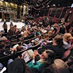 FLAGSHIP PRODUCTION: The audience gathers for the performance of Trinity Repertory Company’s 49th annual production of “A Christmas Carol” on Nov. 12, inside the Providence theater. PBN PHOTO/MICHAEL SALERNO