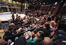 State theatre aims to reflect all of Rhode Island on and off the stage FLAGSHIP PRODUCTION: The audience gathers for the performance of Trinity Repertory Company’s 49th annual production of “A Christmas Carol” on Nov. 12, inside the Providence theater.
PBN PHOTO/MICHAEL SALERNO