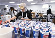 Alignment between execs, staff keeps DEI work sustainable FOOD PREP: Rith Hou, recipe support and team expediter, assembles containers of ricotta cheese at meal delivery service provider Feast & Fettle Inc. in East Providence.
PBN PHOTO/MICHAEL SALERNO