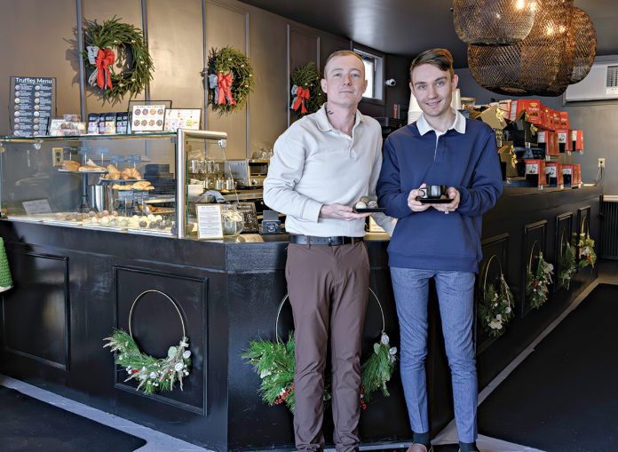 DESSERT DESTINATION: Tamp co-owners Sean Reilly, left, and Dylan Freitas opened the truffle and espresso cafe in Bristol in October following the success of their Mason & Twine LLC food truck.
PBN PHOTO/MICHAEL SALERNO DESSERT DESTINATION: Tamp co-owners Sean Reilly, left, and Dylan Freitas opened the truffle and espresso cafe in Bristol in October following the success of their Mason & Twine LLC food truck.
PBN PHOTO/MICHAEL SALERNO
