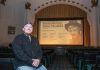 At small local theaters, the plot still thickens PLAYING NOW: Alex Whitney is director of operations at Jane Pickens Theater in Newport, a location that first started showing films in the 1920s and continues to operate in part because of the mix of events that take place there, such as a recent “Remembering Robert Redford” film series.
PBN PHOTO/KATE WHITNEY LUCEY