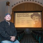 At small local theaters, the plot still thickens PLAYING NOW: Alex Whitney is director of operations at Jane Pickens Theater in Newport, a location that first started showing films in the 1920s and continues to operate in part because of the mix of events that take place there, such as a recent “Remembering Robert Redford” film series.
PBN PHOTO/KATE WHITNEY LUCEY