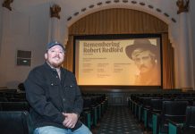 PLAYING NOW: Alex Whitney is director of operations at Jane Pickens Theater in Newport, a location that first started showing films in the 1920s and continues to operate in part because of the mix of events that take place there, such as a recent “Remembering Robert Redford” film series.  PBN PHOTO/KATE WHITNEY LUCEY