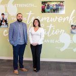 TRUSTED PARTNERS: Ruben Tejada, left, manager of the Office of Diversity, Equity and Inclusion, and Gisselle Valencia, director of human resources, at Neighborhood Health Plan of Rhode Island in Smithfield. Tejada says the company’s customer focus is rooted in cultural competency, language access and community engagement. PBN PHOTO/TRACY JENKINS
