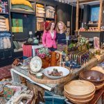 Holiday sales are up, but retailers aren’t exactly feeling confident GOODS NATURED: Sisters Karen Deutsch, left, and Ellen Deutsch in their Providence home goods shop called Stewart House in 2023. They say they compete with large retailers during the holiday season by offering personalized services. / PBN FILE PHOTO/MICHAEL SALERNO