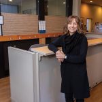 New ‘Express Care’ clinic bridges mental health gap QUIET FOR THE MOMENT: Gretchen Anderson, senior clinical director of ambulatory and outpatient behavioral health at Butler Hospital, stands at the desk outside the hospital’s Express Care walk-in clinic, catering to people in need of immediate mental health services.
PBN PHOTO/TRACY JENKINS