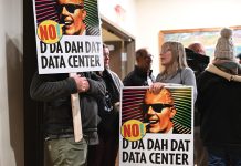 Opposition is building against expanding plans for data centers SIGNS OF THE TIMES? People opposed to a data center proposal at the former Pennhurst state hospital grounds in Spring City, Pa., brought signs to express their opposition to the plan at an East Vincent Township supervisors meeting on Dec. 17.
AP FILE PHOTO/MARC LEVY