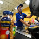 Inflation cooled slightly in December though it remains above Fed’s target