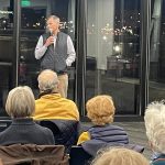 ALBERT DAHLBERG, assistant vice president of the office of government and community relations at Brown University, addresses members of the community at the Jewelry District Association January Meeting at the CIC building. PBN PHOTO/ VEER MUDAMBI