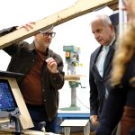 TEST SUBJECT: Justin Sirotin, left, co-founder of Octo Product Development Inc., shows U.S. Sen. Jack Reed a mockup of a cockpit used by Regent Craft Inc. at Octo’s design lab in Providence. Regent is developing 12-passenger seagliders at its North Kingstown headquarters.  COURTESY OCTO PRODUCT DEVELOPMENT INC.