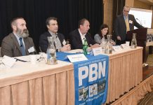 DLT urges employers to use Real Jobs RI amid uncertain federal funding IN DEMAND: Karl Wadensten, center, CEO and president of VIBCO Inc. and R.I. Commerce Corp. board member, talks about the need for skilled workers during the first panel discussion of Providence Business News’ 2026 Workforce Development Summit at the Providence Marriott Downtown on Feb. 19. With Wadensten on the panel are, from left, Matthew Weldon, director of the R.I. Department of Labor and Training; Farouk Rajab, CEO and president of both the Rhode Island Hospitality Association and the Rhode Island Hospitality Education Foundation; and Rosa Brito, manager of workforce development at Brown University Health. PBN Editor Michael Mello, standing, moderates.
PBN PHOTO/MIKE SKORSKI