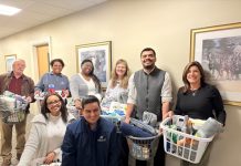 Washington Trust donates welcome-home kits to Crossroads residents moving into new Providence housing