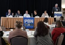 TED WILLIAMS, far left, president of Senesco Marine LLC, speaks during one of the panel discussions at Providence Business News' 2026 Emerging Industries Summit on Wednesday. Also on the panel is, from left, Ben Sorkin, CEO of Flux Marine Ltd.; Jason Noel, operations executive at Juice Robotics LLC; Linda Larsen, maritime and industry engagement manager at Polaris Tech Bridge; and Daniela Fairchild, chief strategy officer at R.I. Commerce Corp. PBN Editor Michael Mello, standing, is moderating. / PBN PHOTO/MIKE SKORSKI