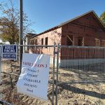 MORE ­NEEDED:  An affordable housing project under construction in East Providence in 2024 that has since been completed. A sign at the site calls for the passage of the $120 million housing bond issue in November 2024.  PBN FILE PHOTO/­WILLIAM HAMILTON