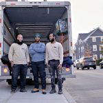 Everybody’s Business: Helping formerly incarcerated individuals move on SUPPORT SYSTEM: Trent Manning, center, is the founder and owner of Down The Road Movers LLC, a Black-owned moving company that he launched to support formerly incarcerated individuals. Pictured with Manning, from left, are foremen/drivers Genesis Harney and Ryan Fogarty.
PBN PHOTO/MICHAEL SALERNO