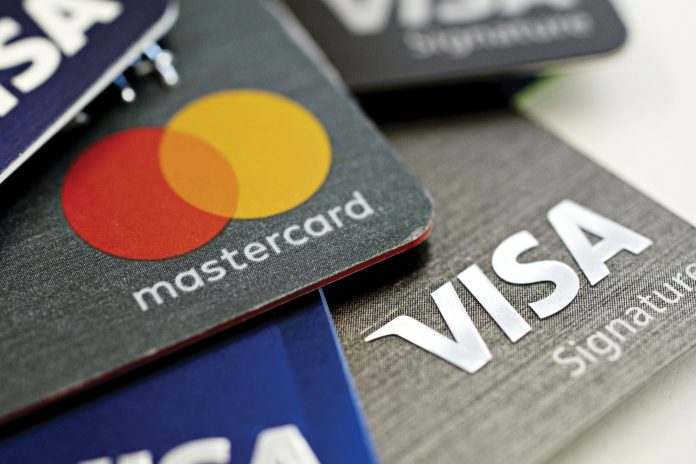 GOOD OR BAD IDEA? President Donald Trump has proposed capping annual percentage rates for credit cards at 10%, but some in the financial services industry think such a move could have a negative ripple effect. AP FILE PHOTO/STEVE HELBER