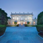 ADDITIONAL PAYMENT: The 11,579-square-foot home at 626 Bellevue Ave. in Newport, which sold for $30 million in 2021, is now assessed at $21.6 million. That will mean an additional $103,200 annual payment to the state under the “Taylor Swift tax” taking effect in July.  COURTESY GUSTAVE WHITE SOTHEBY’S INTERNATIONAL REALTY