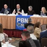 DR. CHRISTOPHER OTTIANO, second from left, interim chief medical officer and medical director at Neighborhood Health Plan of Rhode Island, speaks during one of two panel discussions during Providence Business News' Health Care Summit at Marriott Providence on Thursday. Also on the panel are, from left, Joseph Trunzo, associate director of Bryant University's School of Health and Behavioral Sciences; Linda Hurley, CODAC Inc. CEO and president; and Meghan Grady, Meals on Wheels of RI Inc. executive director. / PBN PHOTO/MIKE SKORSKI
